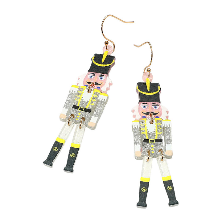 Celebrate the season with these playful pink nutcracker drop earrings featuring whimsical detailing and festive charm. A cheerful statement piece perfect for holiday parties, gifting, or adding a touch of Christmas spirit to your everyday winter style.