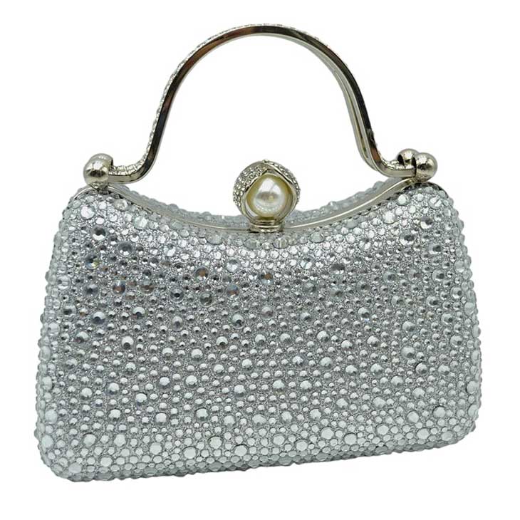 Silver Crystal Diamond Top Handle Embellished Evening Clutch Bag is a remarkable evening bag, crafted from premium materials with a crystal diamond top handle for a special touch. Featuring a soft-textured fabric lining and a stylish, elegant exterior, this clutch bag is ideal for special occasions. 