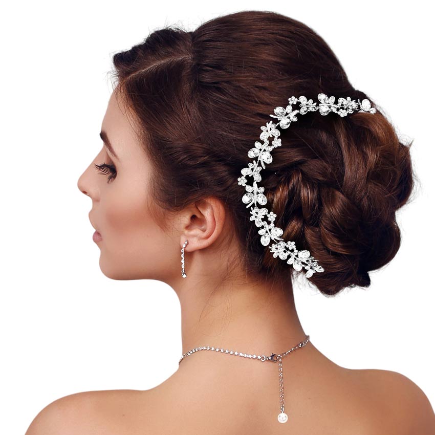 Silver Floral Oval Stone Accented Bun Wrap Headpiece, Elevate your special occasion or wedding hairstyle with this exquisite piece. With delicate floral motifs and shimmering oval stones, it's the perfect finishing touch for brides, or anyone looking to make a statement. Give the gift of timeless beauty with this headpiece.