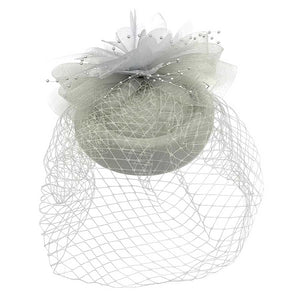Silver Floral Pearl Mesh Fascinator Headband, the perfect accessory for special or casual occasions. Crafted from supple mesh and finished with lush faux pearls, this Fascinator Headband elevates any look. A timeless and elegant piece, sure to be a favorite. A perfect gift on any occasion to your family members or a close one