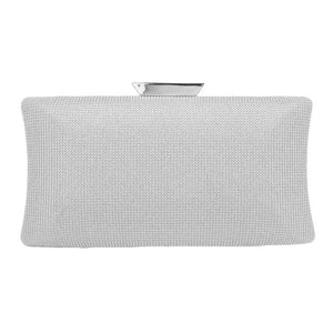 Silver Glittered Rectangle Evening Clutch Crossbody Bag adds a touch of glamour to any evening look. Crafted from fine-glittered material, this clutch features a distinctive rectangle shape. The adjustable shoulder strap allows you to effortlessly switch between a clutch and a crossbody bag.