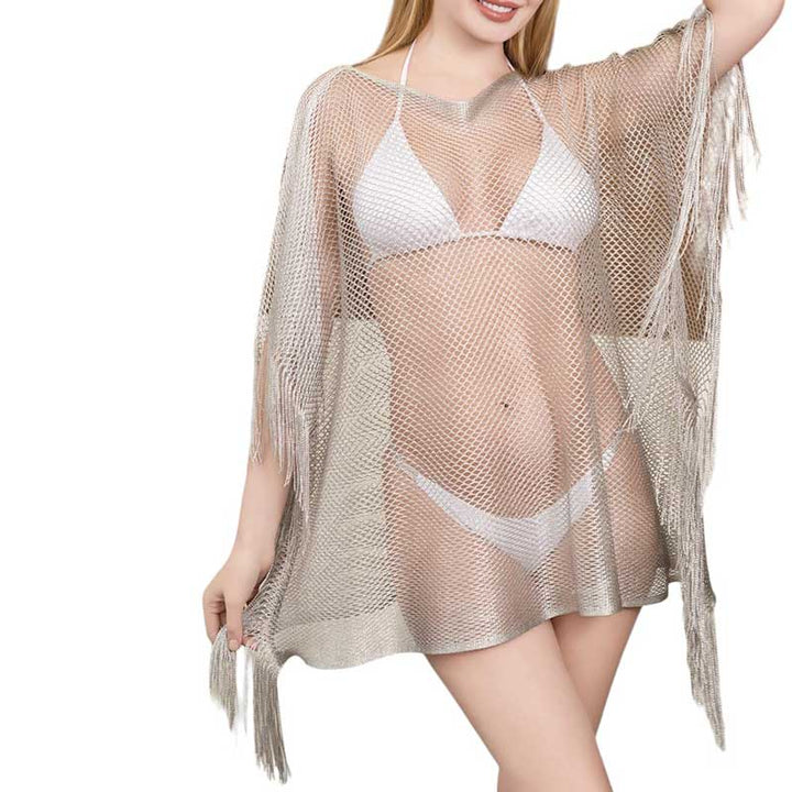 Silver Metallic Tassel Cover Up Kimono Poncho, Add some shimmer to your beach look with our cover up poncho. This stylish and playful cover up doubles as a kimono and poncho, perfect for any pool party or beach day. Stand out with the metallic detailing and have fun with the tassel accents.