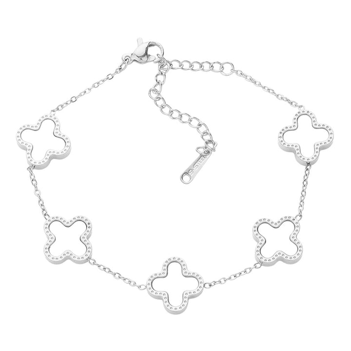 Silver Mother of Pearl Stainless Steel Quatrefoil Station Bracelet is both elegant and durable, making it the perfect accessory for any occasion. The mother-of-pearl accents add a touch of sophistication, while the stainless steel material ensures long-lasting wear. Showcase your style with this stunning bracelet.