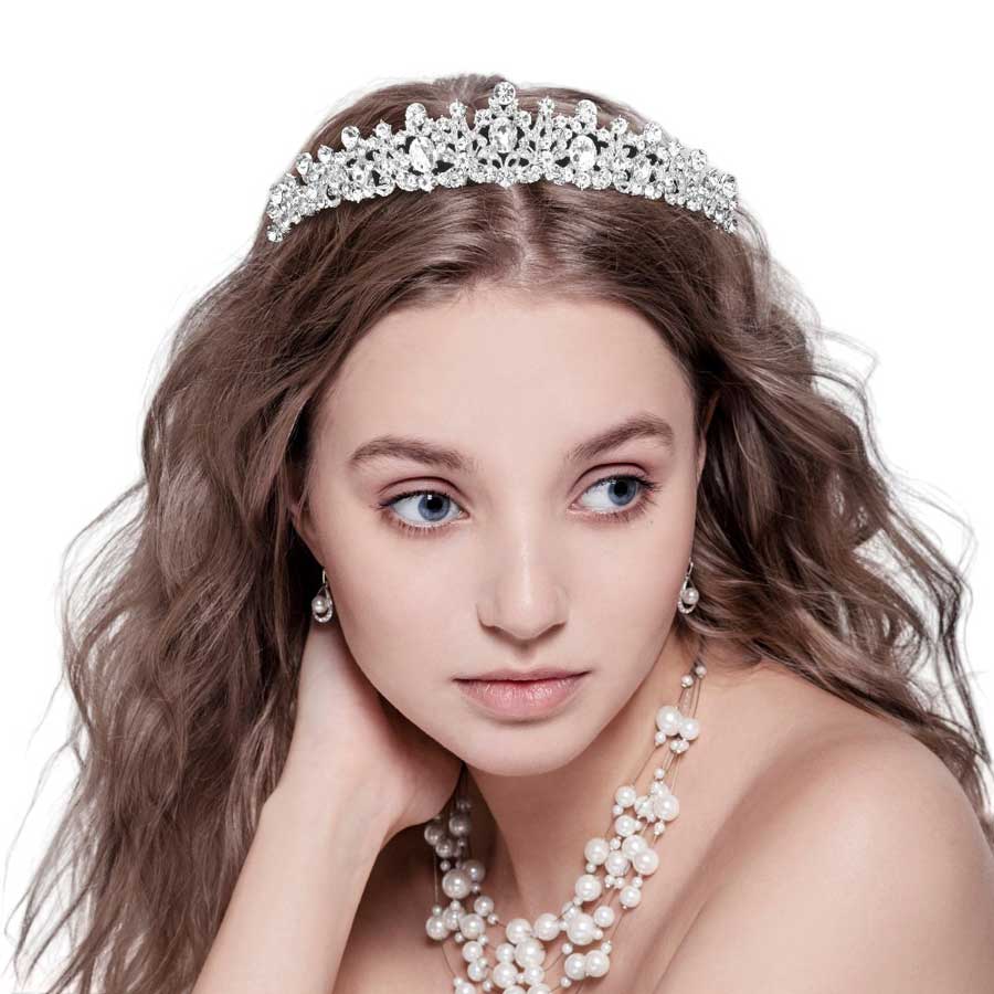 Silver Oval Stone Pointed Princess Tiara, is an ideal accessory for special occasions. Its classic design is crafted with quality materials featuring an oval stone with pointed edges for a timeless look. Look regal and sophisticated with this exquisite tiara. Ideal gift for loved ones on any special day. 