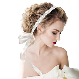 Silver Pearl Round Baguette Stone Sash Ribbon Bridal Wedding Belt Headband, adds a luxurious touch to your wedding day with this timeless pearl round-baguette bridal wedding belt headband. It's perfect for a classic or modern wedding, adding a timeless touch to your bridal outfit. Perfect for brides, and bridal parties.