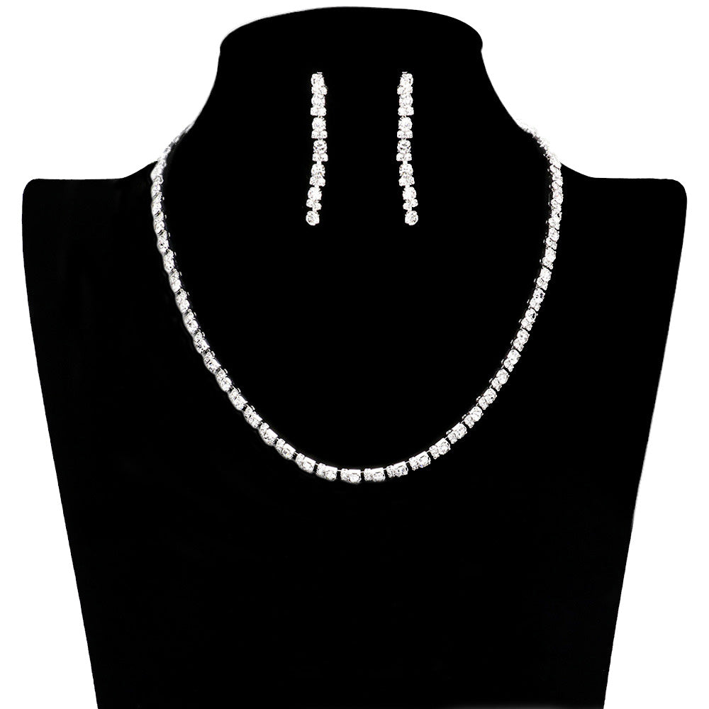 Silver Rhinestone Cluster Jewelry Set, this classic jewelry set features a rhinestone cluster design for timeless elegance. Perfect for special occasions or party wear. Perfect gift choice for birthdays, anniversaries, weddings, bridal showers, or any other meaningful occasion. 