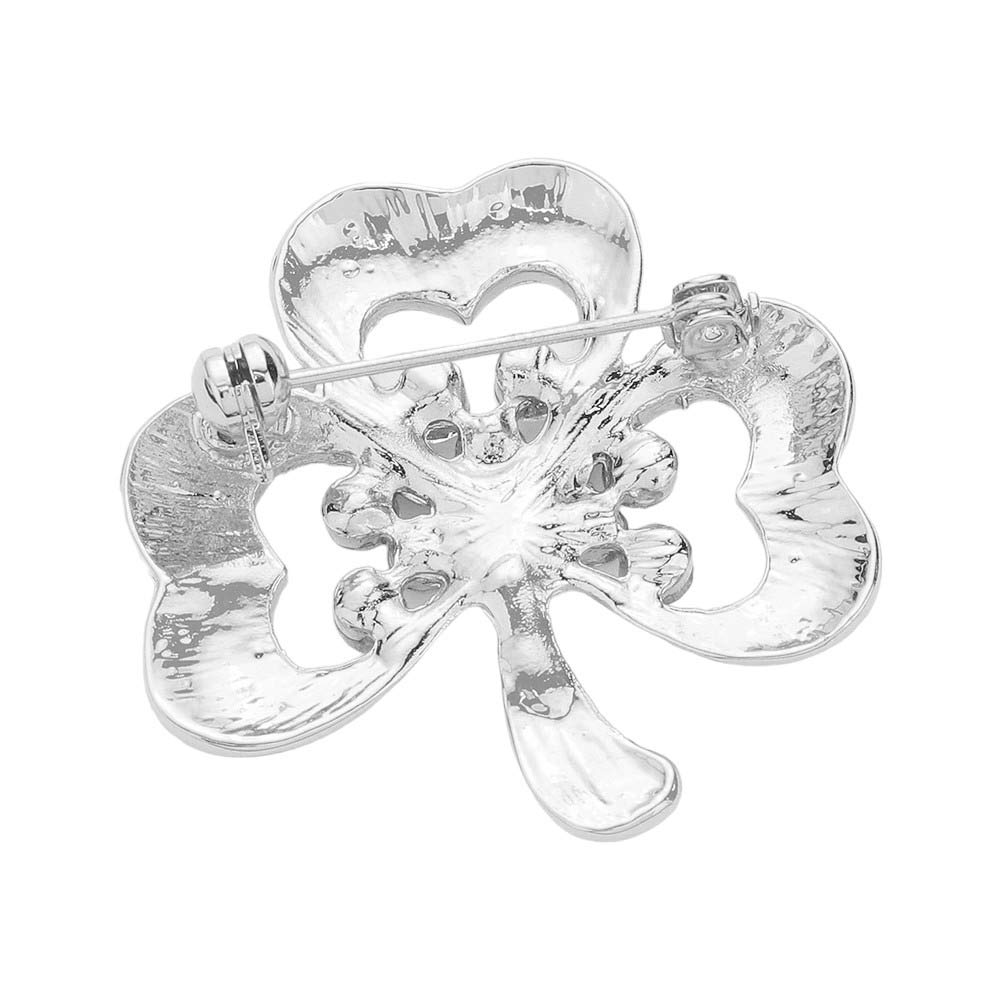 Silver Rhinestone Enamel Clover Pin Brooch, is an elegant accessory that adds a touch of sophistication to any outfit. The sparkling rhinestones and delicate enamel clover design make it a perfect statement piece for any occasion. With its versatile appeal, this brooch is a must-have for any fashion-forward individual.