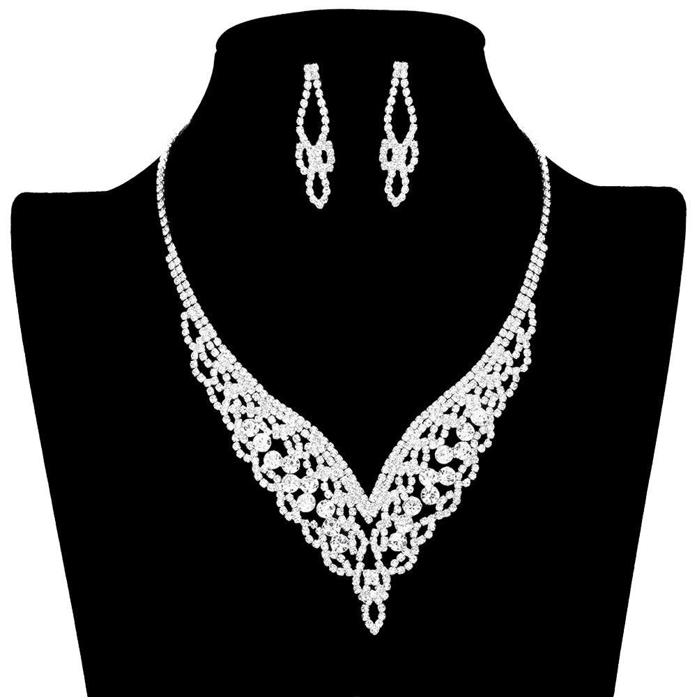 Silver Round Stone Cluster Accented Rhinestone Jewelry Set is a must-have for any special occasion. Featuring a cluster of sparkling rhinestones set in a round stone setting, this jewelry set is sure to make a stunning statement. Enjoy the timeless elegance of this eye-catching set. Perfect occasional gift idea.