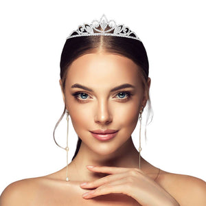 SIlver Round Stone Pointed Rhinestone Princess Tiara, is a stunning accessory perfect for special occasions. Crafted with quality materials and rhinestones, this tiara will add sophistication and glamour to any outfit. Its flexible design ensures a perfect fit. Perfect gift for family members on any special day.