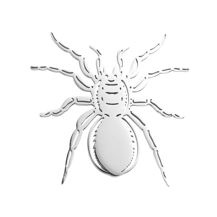 Silver Stainless steel cutout spider pin brooch is a sleek and stylish accessory that adds a touch of edginess to any outfit. Made from high-quality stainless steel, it is durable and long lasting, making it a great addition to your jewelry collection. With its unique design and expert craftsmanship, this pin brooch is sure to make a statement.