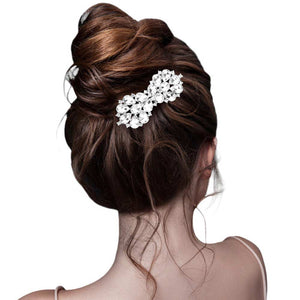 Silver Teardrop Stone Cluster Bow Hair Comb, completes any look. Its bow design is intricately crafted with a cluster of teardrop stones for sparkle and shine. Its lightweight design ensures a comfortable fit for all-day styling. Perfect for gifts or Weddings, Birthdays, Anniversaries, or any other special occasion. 