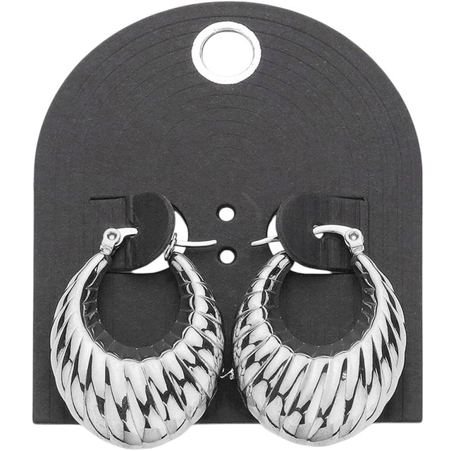 Silver Textured Metal Hoop Pin Catch Earrings offer a stylish and secure way to accessorize any outfit. The unique textured design adds a touch of sophistication while the pin catch closure ensures your earrings stay in place all day. Made with quality materials, these earrings are a must-have for any fashion-forward individual.