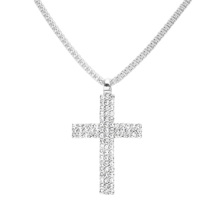 Silver Rhinestone Paved Cross Pendant Jewelry Set is exquisitely crafted from premium-grade metal alloy for a lasting shine. Its intricate design is adorned with shimmering rhinestones for an elegant look. The set includes a matching necklace and earrings. Perfect gift for religious friends and family members.