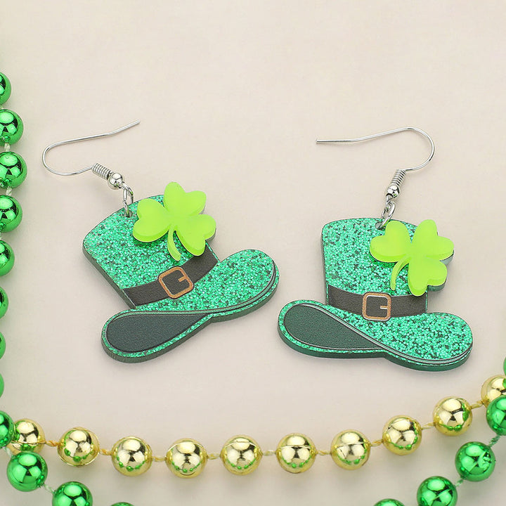 St Patricks Day Glittered Resin Leprechaun Hat Dangle Earrings are the perfect accessory for any St. Patrick's Day celebration. Made of durable resin, these earrings feature a charming leprechaun hat design, adding a touch of fun and luck to your outfit. Get ready to show off your Irish spirit.