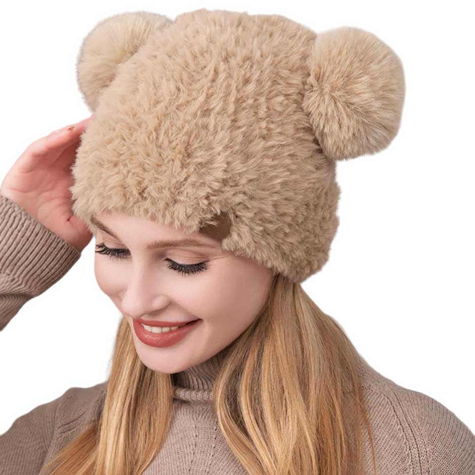 Tan Faux Fur Pom Pom Ear Beanie Hat, stay warm in style with this comfy beanie hat. Crafted with high-quality faux fur, this piece offers maximum insulation and a fashionable look. This is the perfect hat for any stylish outfit or winter dress. Perfect gift for Birthdays, Christmas, holidays etc. to your friends, family.