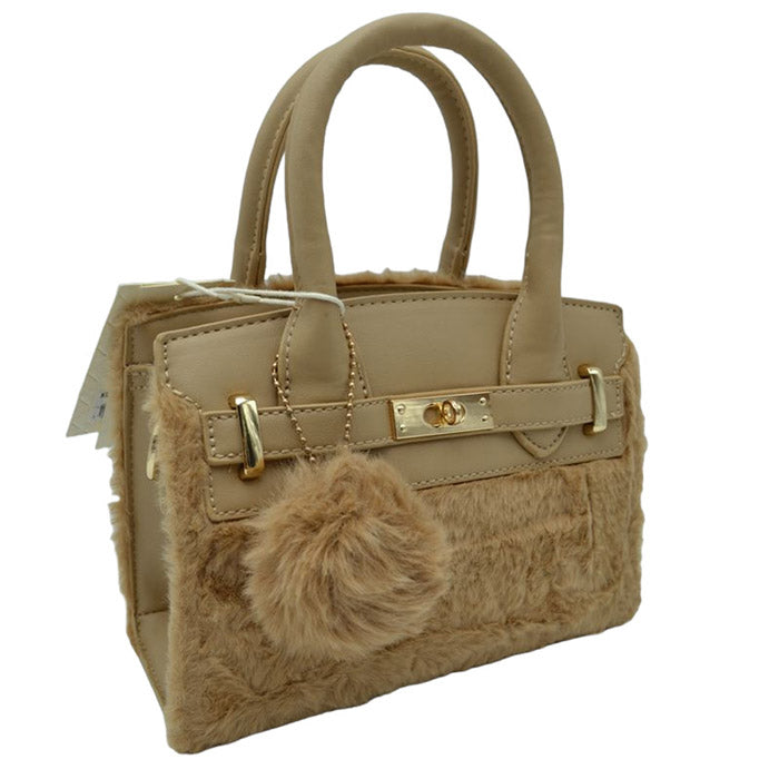 Cozy up to our Tan Faux Fur and Vegan Leather Small Tote Crossbody Bag adjustable strap, Faux Fur Pom Pom Keychain! This bag is the perfect blend of style and comfort. This cuddly accessory provides an easy way to carry around your favorite things without compromising on looks. Goes from work to play in a snap!