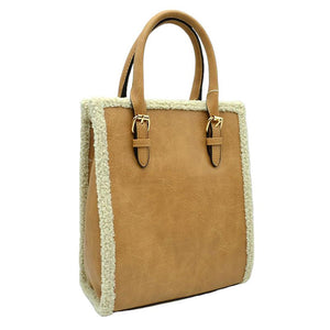 Tan Faux Shearling Trim With Detachable Strap Crossbody Tote Bag. This stylish bag features an elegant faux shearling trim and a detachable strap for extra versatility. The faux shearling trim provides a pleasant and luxurious feel to the bag. It is perfect for carrying your daily essentials, from books to work essentials.