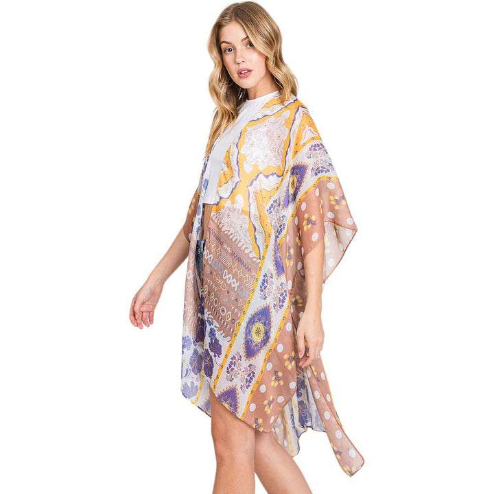 Taupe Abstract Paisley Flower Print Kimono Poncho, Expertly crafted with an abstract paisley print, this kimono poncho is a versatile addition to any wardrobe. Made with lightweight, breathable material, it's perfect for layering over any outfit for a chic look. Enjoy the unique design and comfortable fit of this piece.