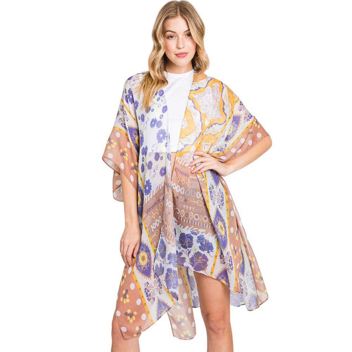 Taupe Abstract Paisley Flower Print Kimono Poncho, Expertly crafted with an abstract paisley print, this kimono poncho is a versatile addition to any wardrobe. Made with lightweight, breathable material, it's perfect for layering over any outfit for a chic look. Enjoy the unique design and comfortable fit of this piece.