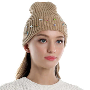 Taupe Bling Stone Embellished Knit Beanie Hat, wear this beautiful beanie hat with any ensemble for the perfect finish before running out the door into the cool air. The hat is made in a unique style and it's richly warm and comfortable for winter and cold days. Perfect gift item for all occasions.