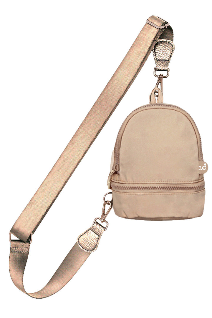 Taupe C.C Mini Solid Sling Backpack offers a compact yet functional design, perfect for hands-free convenience. Crafted with durable materials, it ensures long-lasting use while providing secure storage for essentials. Its adjustable strap allows for a comfortable fit, making it ideal for daily errands or travel. This sleek backpack combines practicality with style, delivering expert-level utility in a minimalist package. 