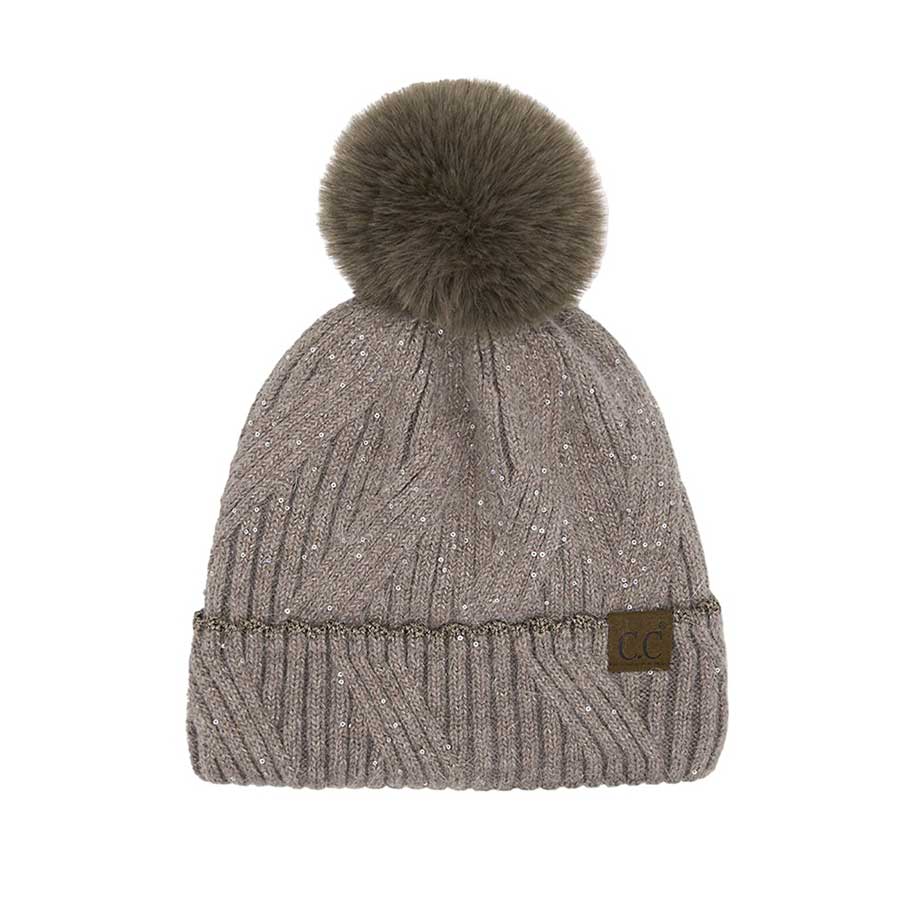 Taupe C.C Sequin with Pom Beanie Hat, stay cozy and stylish this winter with our unique beanie hat. Crafted from a soft and comfortable material. It's the autumnal touch you need to finish your outfit in style. Awesome winter gift accessory for birthdays, Christmas, holidays, anniversaries, family, and loved ones.