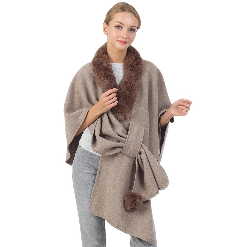 Taupe Faux Fur Collar Pom Pom Poncho, with the latest trend in ladies' outfit cover-up! The high-quality knit poncho is soft, comfortable, and warm but lightweight. It's perfect for your daily, casual, party, evening, vacation, and other special events outfits. A fantastic gift for your friends or family.