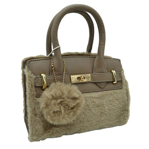 Cozy up to our Taupe Faux Fur and Vegan Leather Small Tote Crossbody Bag adjustable strap, Faux Fur Pom Pom Keychain! This bag is the perfect blend of style and comfort. This cuddly accessory provides an easy way to carry around your favorite things without compromising on looks. Goes from work to play in a snap!