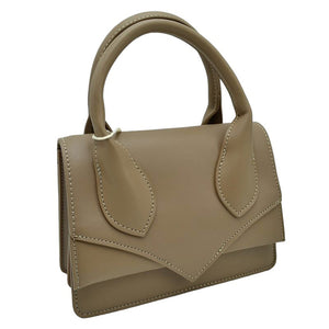 Taupe Faux Leather Top Handle Le Chiquito Tote Bag, is stylish, durable, and practical. The bag is made of faux leather with a sturdy top handle and an adjustable shoulder strap. The roomy design offers plenty of space. Experience effortless style and convenience with this chic, multi-functional tote.