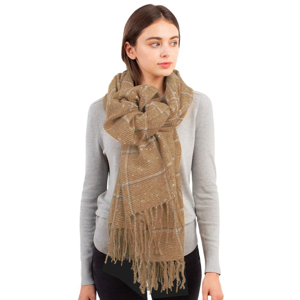 Taupe Glitter Checker Pattern With Tassel Scarf, is the perfect addition to any outfit. Crafted from a lightweight, breathable fabric, it has a glitter checker pattern and tassels for a sophisticated look. It's a perfect gift choice for loved ones on cold ace. Enjoy all-day comfort and effortless style with this scarf. 