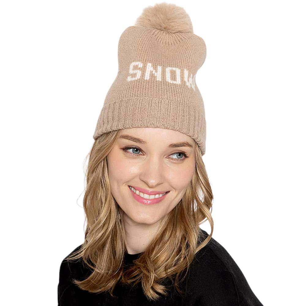 Taupe Snow Message Faux Fur Pom Pom Cable Knit Beanie Hat, Keep your head warm and stylish this winter with this hat. This fashionable beanie is made from soft, cable-knit fabric. Perfect gift choice in winter days for young adults, fashion forwarded friends & family members, teenagers, fashion enthusiasts, and yourself.