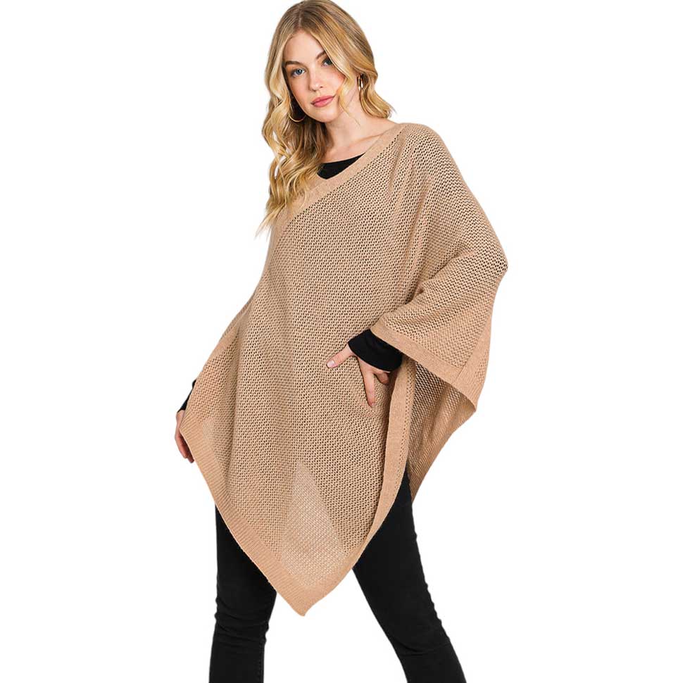 Taupe Solid Knit Loose Fit Poncho, Crafted from a comforting, arctic wool blend fabric, features a loose-fitting design that will keep you cozy without compromising on style. Perfect for day-to-day wear. Look stylish and stay warm in this stylish poncho. It can be a stylish gift to family members or fashion loving friends.