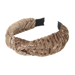 Taupe This Striped Velvet Knot Burnout Headband offers a trendy and modern combination of textures with its unique mix of 50% polyester and 50% plastic construction. The velvet design and burnout details create an eye-catching piece perfect for completing any look.