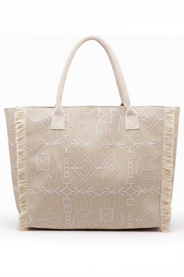 Taupe Carry your essentials in bohemian style with this eye-catching tote bag. Featuring a vibrant geometric and elephant print design accented with playful fringe detailing, it's the perfect accessory for everyday adventures or weekend getaways. Crafted from durable 100% polyester, this spacious tote measures 21" x 14.25" x 5" and includes a secure zipper closure to keep your belongings safe. An inner pocket provides convenient organization for smaller items. Whether you're heading to the market, beach, or