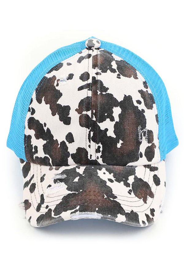 Turquoise C.C cow print criss cross ponycap is the perfect blend of style and functionality. The adjustable criss cross design allows for a comfortable and secure fit, while the unique cow print pattern adds a touch of fun to any outfit. Made with high-quality materials, this ponycap is durable and long-lasting.