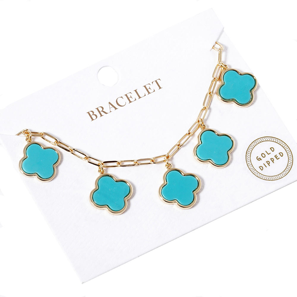 Turquoise Gold Dipped Quatrefoil Charm Station Bracelet, is the perfect accessory for any occasion. Crafted from quality materials, it features an attractive quatrefoil charm station and a classic clasp for added security. The perfect blend of fashion and function. Excellent gift for the people you love on any occasion.