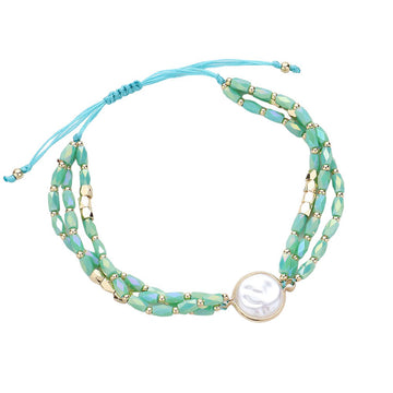 Turquoise Pearl Pointed Faceted Beaded Pull Tie Cinch Bracelet, Indulge in luxury with our dazzling and elegant bracelet features beautifully crafted pearls and faceted beads, all perfectly strung together for a stunning piece that will elevate any outfit. With its adjustable pull tie cinch, you can achieve the perfect fit.