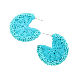 Turquoise Raffia Wrapped Seed Beaded Round Earrings, Expertly crafted with a combination of raffia and seed beads, these round earrings add a touch of natural elegance to any outfit. The intricate beadwork and unique wrapping technique showcase expert artistry. Elevate your style with these earrings, perfect for any occasion.