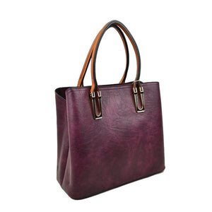 Velvet Solid Faux Leather Tote Bag Shoulder Bag, is perfect for the modern woman. Crafted with genuine faux leather, this stylish bag is durable, light, and spacious, and with adjustable straps, it is perfect for everyday use. Its sleek design will have you turning heads wherever you go.
