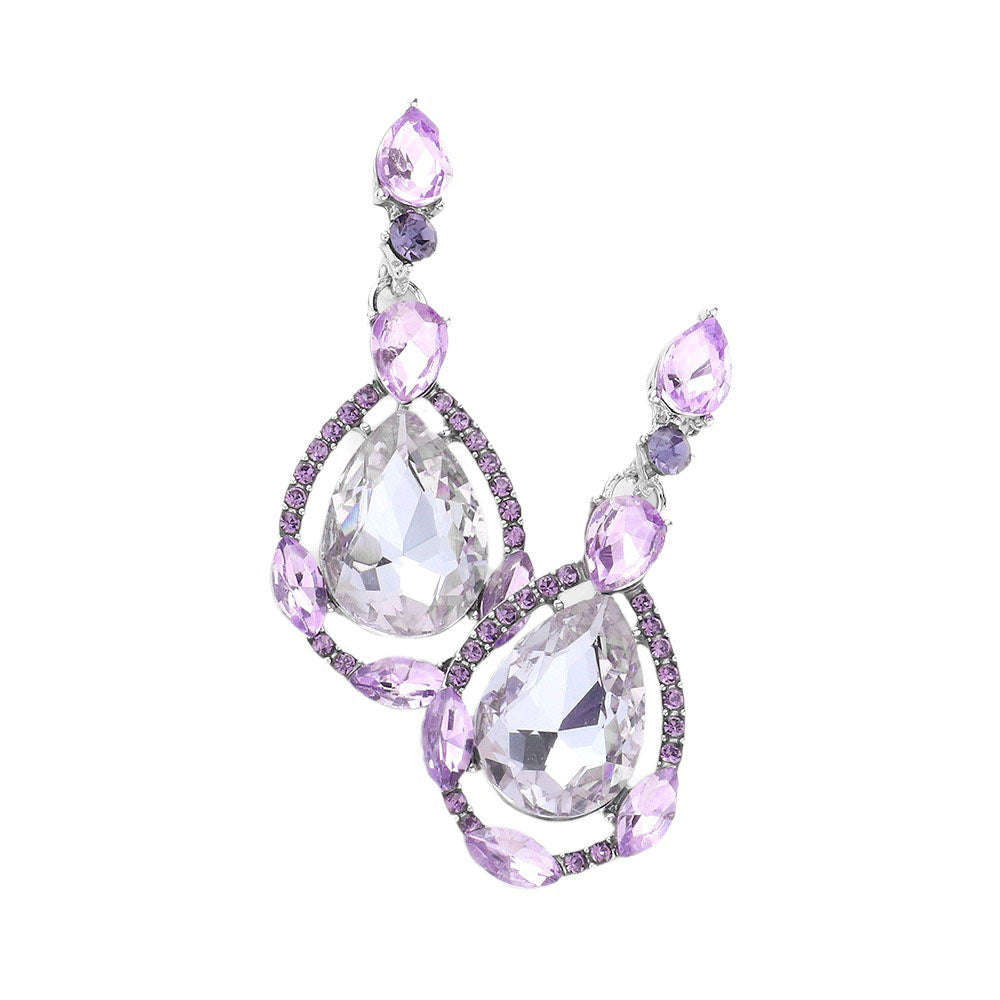 Violet Crystal Rhinestone Teardrop Evening Earrings, are beautifully crafted with glimmering crystal rhinestones and a teardrop design that adds elegance and charm to your look. They are the perfect accessory for adding a touch of glamour to any special occasion. A quintessential gift choice for loved ones on any special day.