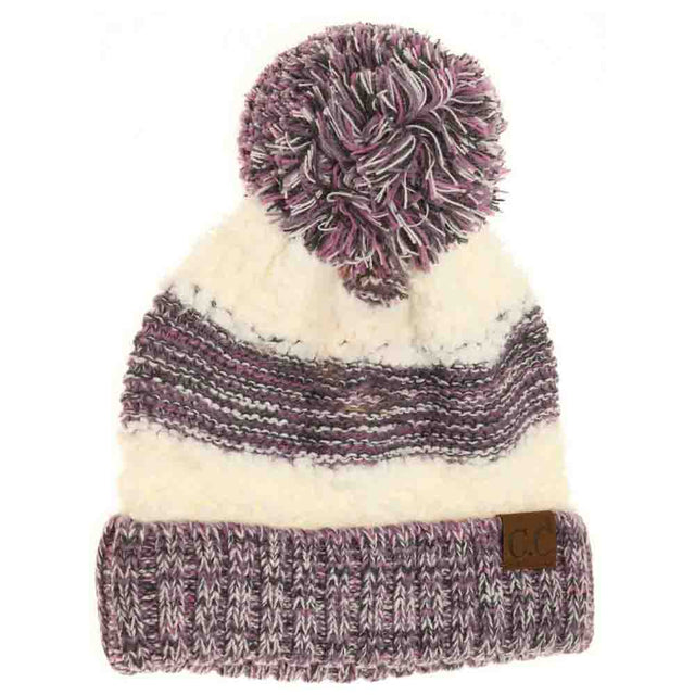 Violet-Popcorn Heathered Knit Pom Beanie combines textured warmth with classic style. Crafted with a heathered knit pattern, it provides cozy insulation while maintaining breathability. The playful pom adds a timeless finishing touch, making this beanie both functional and fashionable for cold-weather wear. Ideal for layering during outdoor activities or everyday casual looks. 
