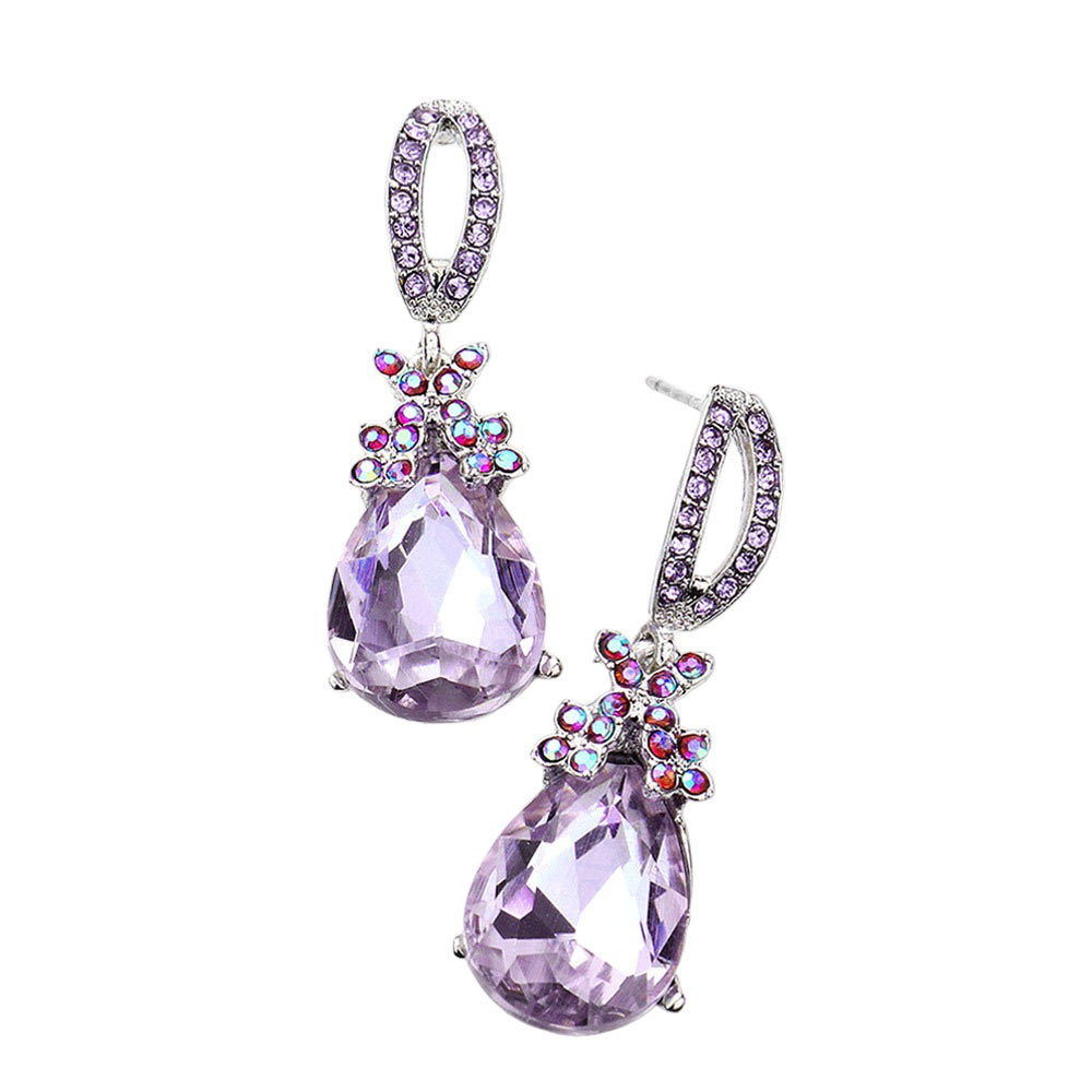 Violet Teardrop Crystal Rhinestone Evening Earrings, are the perfect accessory for any special occasion. Each earring features a teardrop-shaped crystal encrusted in rhinestones for a glamorous sparkle and shine. High-quality stones are set securely in the design. A timeless gift piece that will sparkle for years.