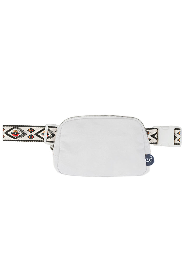 White C.C Aztec Strap Fanny Pack is made with durable material and a unique Aztec strap design. With its adjustable strap and multiple pockets, it provides convenience and style for all of your essentials. Stay hands-free and organized while on the go with this trendy fanny pack.
