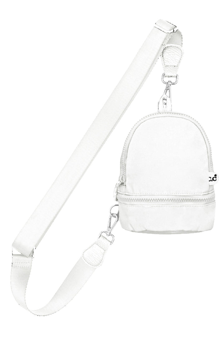 White C.C Mini Solid Sling Backpack offers a compact yet functional design, perfect for hands-free convenience. Crafted with durable materials, it ensures long-lasting use while providing secure storage for essentials. Its adjustable strap allows for a comfortable fit, making it ideal for daily errands or travel. This sleek backpack combines practicality with style, delivering expert-level utility in a minimalist package. 