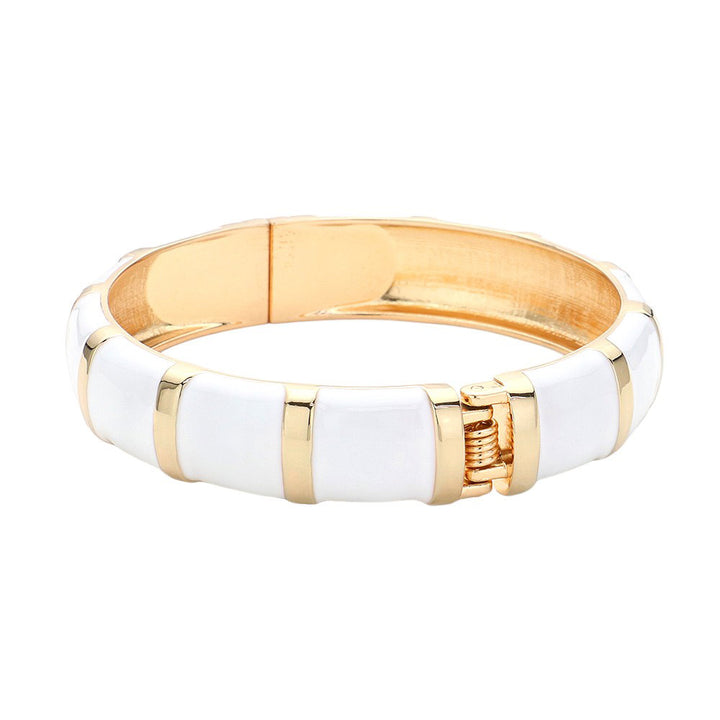 White Enamel Bamboo Hinged Bangle Bracelet, Discover the beauty and elegance of our bracelets that combine the durability of bamboo with the vibrant pop of enamel. Made for everyday wear, the bangle is both stylish and practical, with a hinged design for easy on and off. Add a touch of sophistication to your wardrobe.