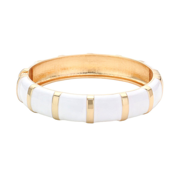 White Enamel Bamboo Hinged Bangle Bracelet, Discover the beauty and elegance of our bracelets that combine the durability of bamboo with the vibrant pop of enamel. Made for everyday wear, the bangle is both stylish and practical, with a hinged design for easy on and off. Add a touch of sophistication to your wardrobe.