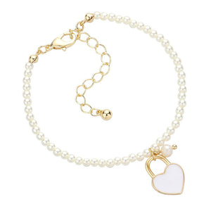 White Enamel Heart Charm Pendant Pearl Bracelet, is a stunning accessory that adds a touch of elegance to any outfit. The enamel heart charm brings a playful yet sophisticated element, while the pearl bracelet exudes timeless beauty. Perfect for any occasion, this bracelet is a must-have for those seeking a stylish look.