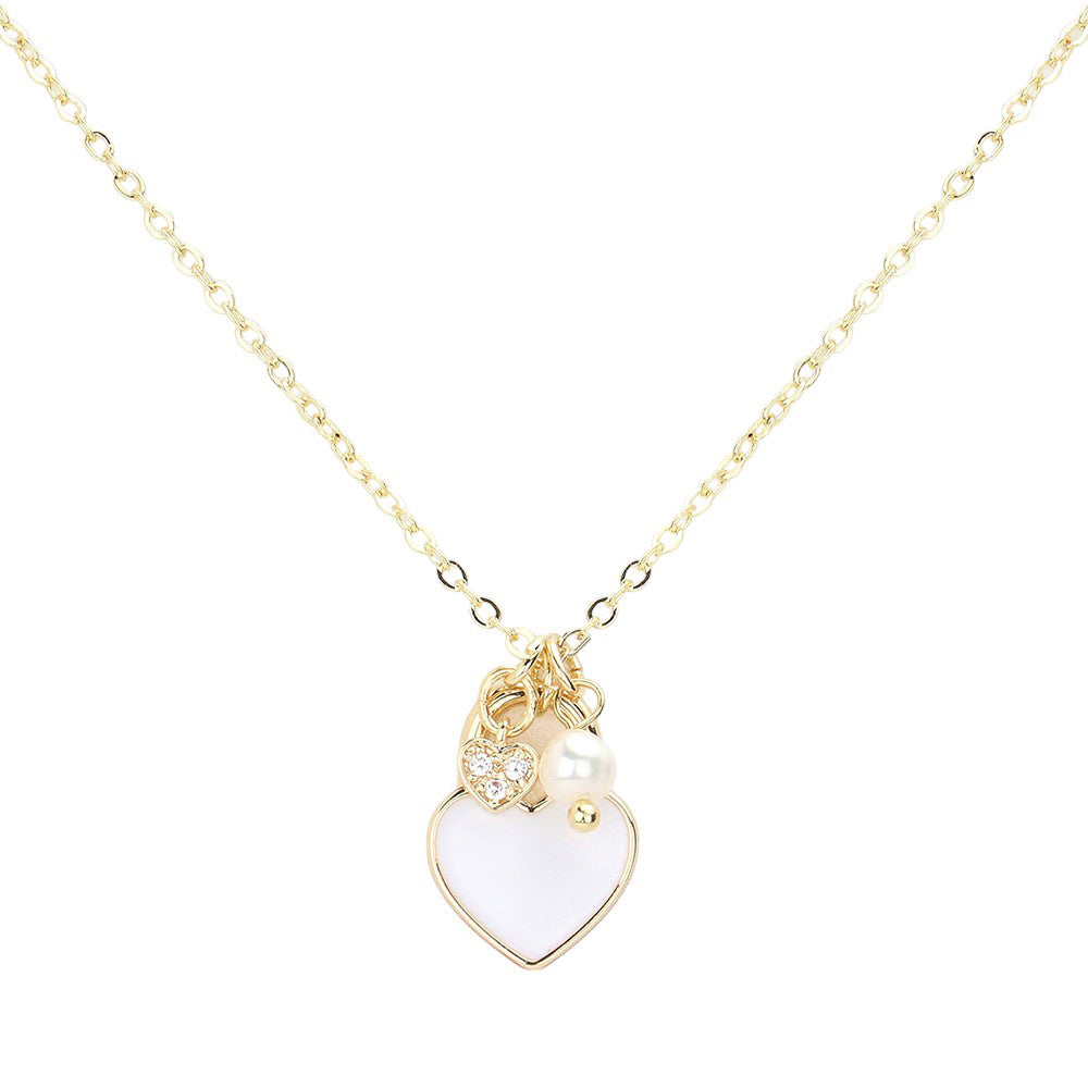 White Enamel Heart Pearl Pendant Necklace, is a stunning addition to any jewelry collection. With its delicate heart-shaped pendant and lustrous pearl, this necklace adds a touch of elegance to any outfit. Handcrafted with high-quality enamel and a pearl, this necklace is a timeless piece that is sure to impress.