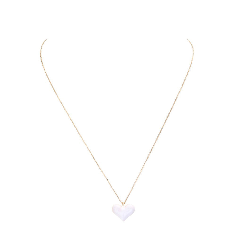 White Enamel Heart Pendant Necklace, Show off your love with our Pendant Necklace. This necklace features a beautiful enamel heart pendant that is both stylish and durable. With its elegant design and high-quality materials, it is the perfect accessory to add to any outfit. Express your love with this must-have necklace.
