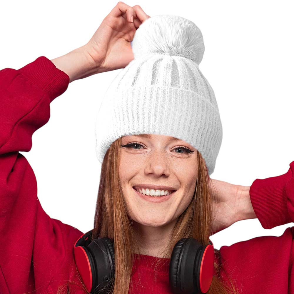 White Fleece Lining Pom Pom Beanie Hat, is perfect for chilly days. This stylish hat is sure to keep you warm and comfortable during the cold. Whether you're headed out for a walk or just spending time outdoors, this fashionable beanie is a great accessory. A perfect gift choice for your close people in the winter season. 